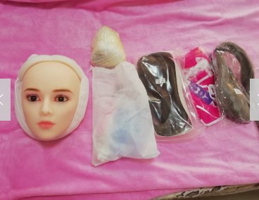 Head, wigs, and clothes bagged separately in the shipment